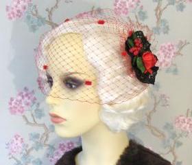 Red dotty birdcage veil.
