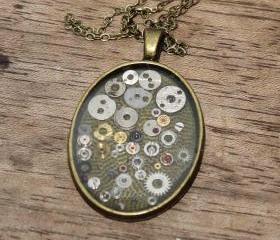 Pretty steampunk style pendant from vintage watch parts