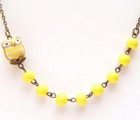Antiqued Brass Yellow Porcelain Round Bead Owl Necklace