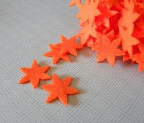 F135 10 felt flowers in one color 1.25 inch