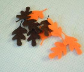 L102 -- 10 leaves on felt brown and orange 2 inch