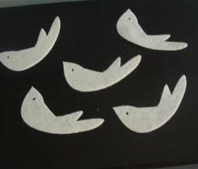 10 Dove on ivory felt 