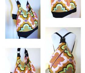 Extra large orange/green prints canvas diaper bag with leather straps, base and zipper top closure