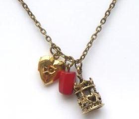 Antiqued Brass Locket Carrousel Coral Necklace