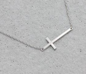 Sideways cross necklace in white gold