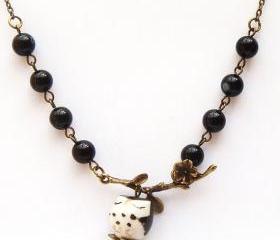 Antiqued Brass Leaf Black Agate Porcelain Owl Necklace