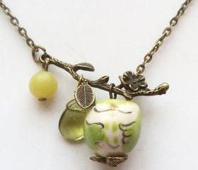 Antiqued Brass Leaf Quartz Jade Porcelain Owl Necklace