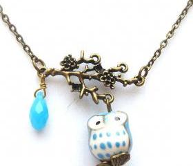 Antiqued Brass Leaf Quartz Porcelain Owl Necklace