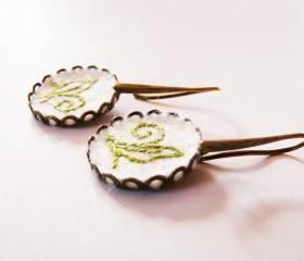 Felt brass Earrings Hand Embroidery olivegreen motif White wool Earrings