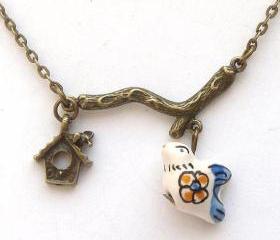 Antiqued Brass Branch Cage Porcelain Bird Necklace
