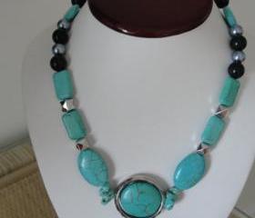 Pretty Turquoise and Silver and Black Accents on an Adjustable Necklace