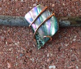 Abalone shell tension set in hand forged polished copper