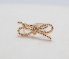 Twist bow adjustable ring in gold 