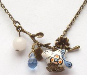 Antiqued Brass Leaf White Jade Quartz Porcelain Bird Necklace