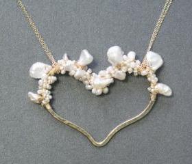 Necklace 270 Hammered heart with keshi & ivory pearls