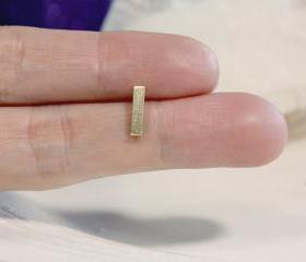 Tiny gold bar earring