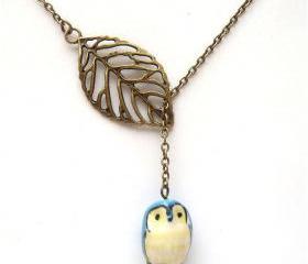 Antiqued Brass Leaf Blue Owl Necklace