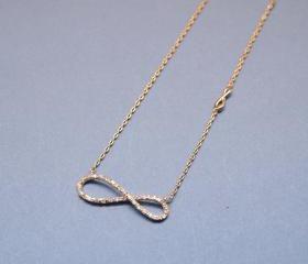 Infinity Knot Necklace with CZ crystals in Gold