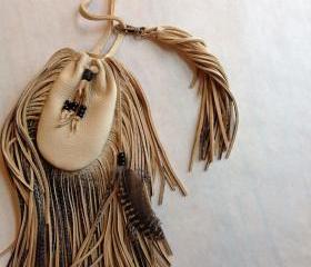 Cream and black leather pouch