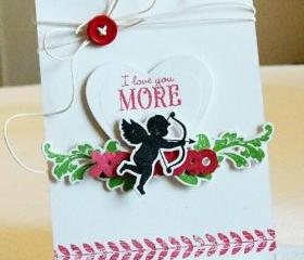 'I Love You More' Greeting Card