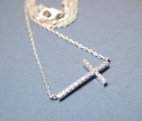 SWAROVSKI SIDEWAYS CROSS NECKLACE IN SILVER