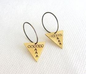 Oxidized Sterling silver hoop earrings with stamped gold brass triangle.