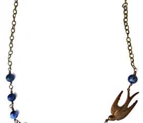 Wire wrapped Trinity Brass Patina Bird swallow pendant & Lapis Lazuli blue gemstone. Swallow Bird Necklace. Antique brass and gemstone.