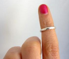 Simple hammered textured sterling silver stack band ring.