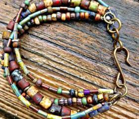 Customization. Multi-strand Bohemian, hippie bracelet. Earth tone. Picasso Czech seed bead glass Jewelry. Bracelet. Brown. Glass and metal 