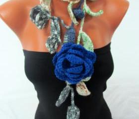 Knitted scarf necklace, flower necklace with green multicolor and blue rose