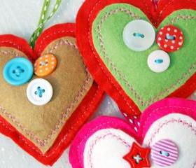 Three Felt Heart Decorations. Christmas Decoration. Happy Christmas to you.