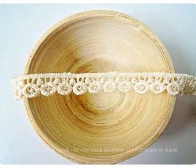 Gold circle loopy cotton trim 