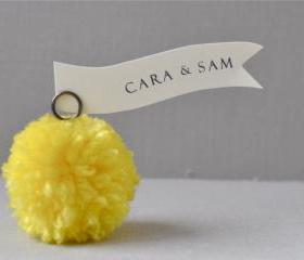 Sunshine/bright yellow yarn pom pom place holders